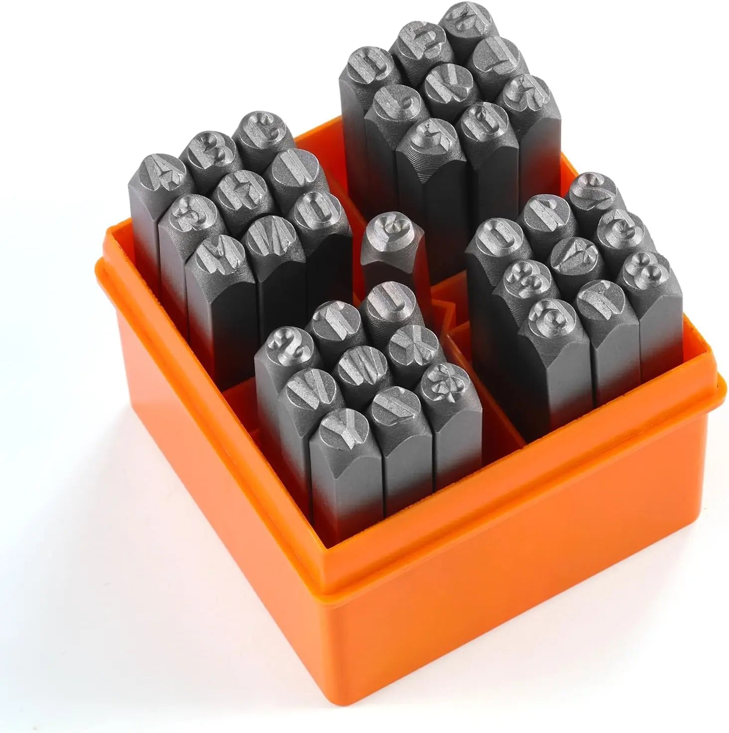 Set of metal stamps in an orange plastic holder on a white background